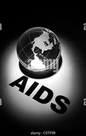 Globe, il concetto globale di diffusione di AIDS e di prevenzione Foto Stock