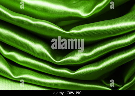 Green accartocciata tessuto di seta sfondo testurizzata Foto Stock