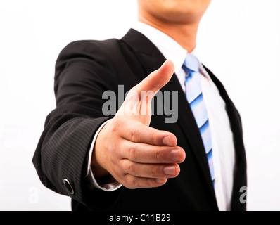 Close up di business man mano che si estende a scuotere Foto Stock