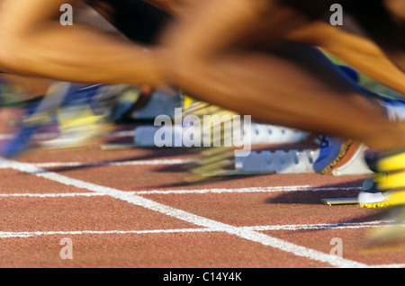 Dettaglio di inizio di donne a 100 metri di gara sprint. Foto Stock