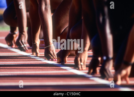 Dettaglio alla linea di partenza di donne a 100 metri di gara sprint. Foto Stock