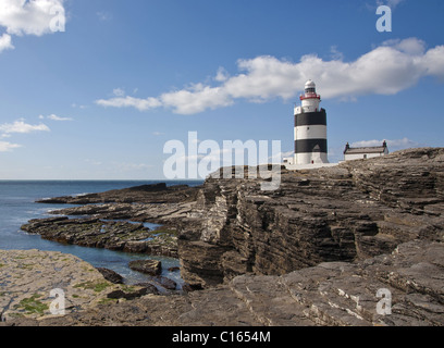 Faro di Hook situato sulla punta della penisola di gancio nella Contea di Wexford in Irlanda,è il più antico faro al mondo. Foto Stock