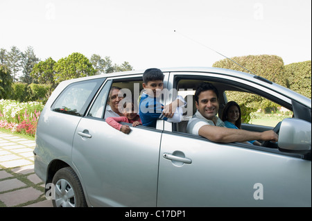 Famiglia in viaggio in auto Foto Stock