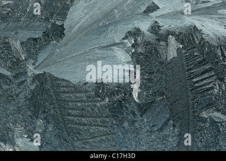 Abstract frost pattern su un vetro di finestra. Foto Stock