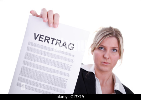 Donna che indossa un costume, che detiene un contratto Foto Stock