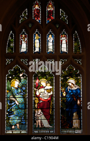 Le finestre di vetro macchiate, la fede, la speranza e la carità, da Edward Burne Jones, la cattedrale di Christ Church, Università di Oxford, Oxford, Oxford Foto Stock