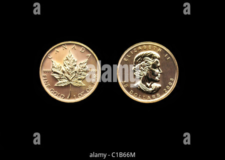 Anteriore e posteriore di un 1 oncia Canadian Maple Leaf moneta in oro Foto Stock