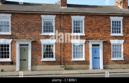 Vecchio stile Georgiano case a schiera sul luogo di mercato della storica città mercato di Olney in North Buckinghamshire England Regno Unito Foto Stock