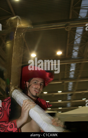 La gente vestita come cosplay di caratteri a romics trade show di roma 2010 Foto Stock