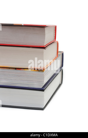 Pila di libri isolato su sfondo bianco Foto Stock