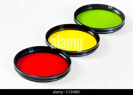 Giallo, rosso e verde i filtri fotografici su bianco Foto Stock