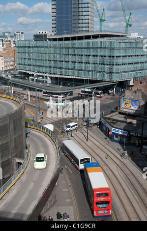 Shudehill Interchange, la stazione di autobus e tram Metrolink arrestare il palazzo di vetro è un parcheggio NCP.Il centro città di Manchester. Foto Stock