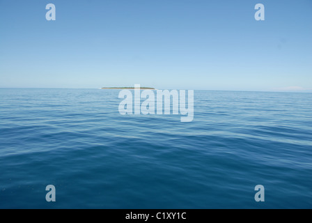 Voce da Gladstone a Queensland isole del sud della barriera corallina, qui l'Isola Heron a distanza Foto Stock