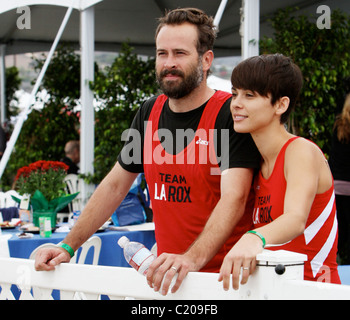 Jason Lee e Ceren Alkac competere nel 2009 Nautica Malibu Triathlon di Los Angeles, California, Stati Uniti d'America - 12.09.09 Foto Stock