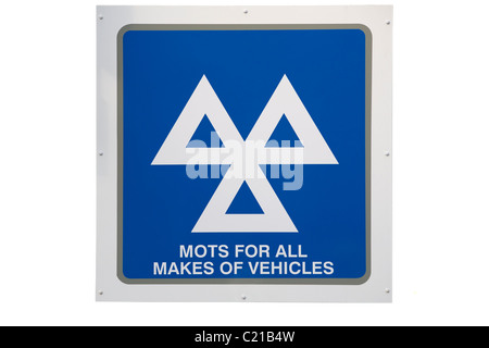 Tagliare MOT / MOTs segno / logo presso un garage che è anche un ministero dei Trasporti auto e test del veicolo e la stazione di servizio. Foto Stock