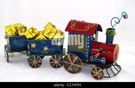 Toy Train con carri di oro Foto Stock