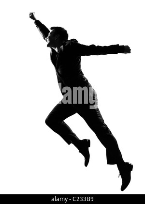 Silhouette caucasian uomo d affari che esprimono il comportamento vincente a lunghezza piena su studio isolato sfondo bianco Foto Stock