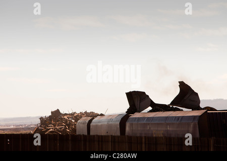 Il carbone essendo caricati su di un treno in Redcar steel works, Teeside, UK. Foto Stock