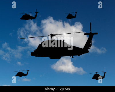 Elicotteri profilarsi in un cielo blu Foto Stock