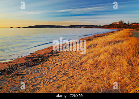 Mumbles attraverso Swansea Bay da ovest Croce, Swansea, Galles Foto Stock