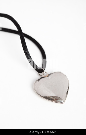 Medaglione in argento close up shot Foto Stock
