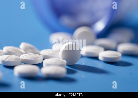 Pillole rovesciate Foto Stock