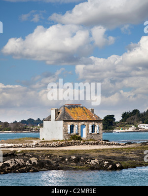 Insolito piccolo Fisherman's cottage su un isola a Saint Cado, Morbihan, in Bretagna, in Francia, in Europa Foto Stock