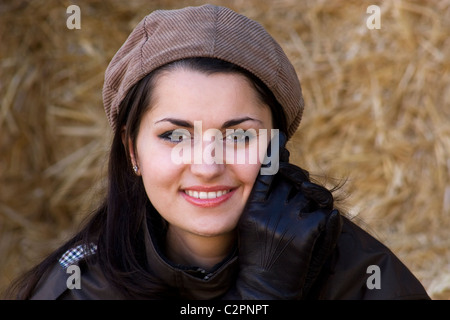 Paese lady in corduroy cap Foto Stock