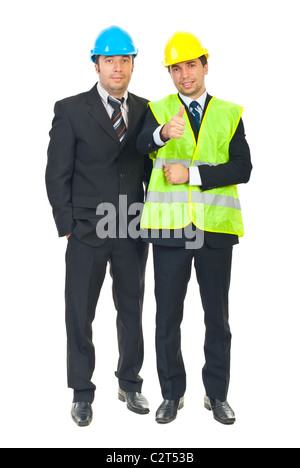 Team di Successo di due ingegneri gli uomini con i caschi isolati su sfondo bianco Foto Stock