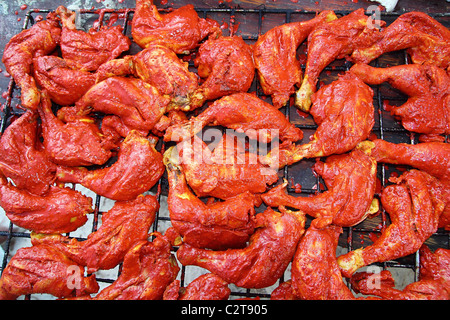 Pollo alla griglia in rosso salsa achiote tikinchik Messico Maya ricetta Foto Stock