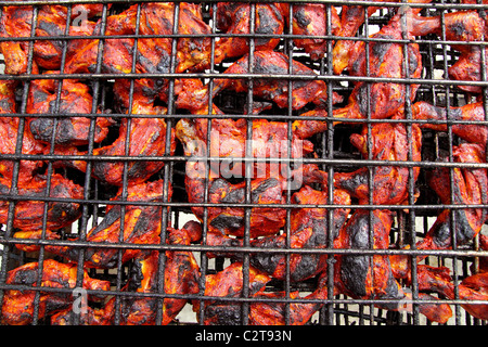 Pollo alla griglia in rosso salsa achiote tikinchik Messico Maya ricetta Foto Stock