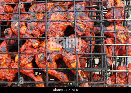 Pollo alla griglia in rosso salsa achiote tikinchik Messico Maya ricetta Foto Stock