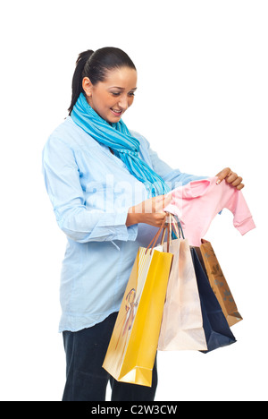 Donna incinta ha acquistato vestiti del bambino e azienda shopping bags isolati su sfondo bianco Foto Stock