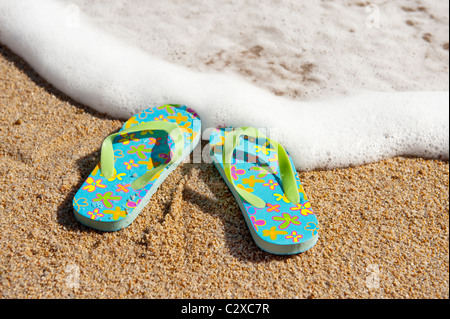 Il flip flop in spiaggia Foto Stock