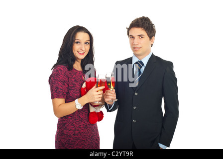 Elegante giovane festeggiare il giorno di San Valentino e tostatura con champagne isolato su sfondo bianco Foto Stock