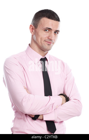 Ritratto di un bel giovane happy businessman in maglia rosa su sfondo bianco Foto Stock