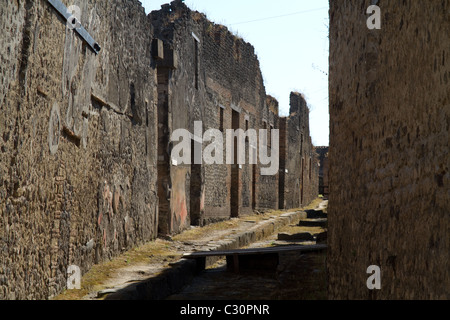 Street in la rovina della città di Pompei Foto Stock