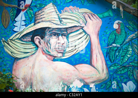 Pittura murale che rappresenta un uomo con le banane, Baracoa, Cuba Foto Stock