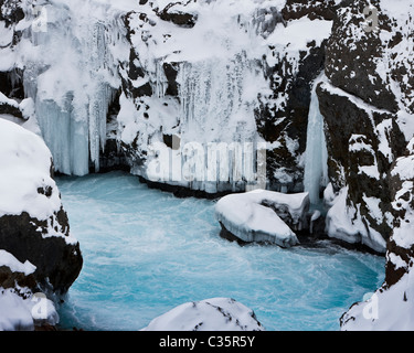 Hraunfossar, congelate, Borgarfjordur, Islanda Foto Stock