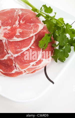 Fette di carne di montone cotto in hot pot Foto Stock
