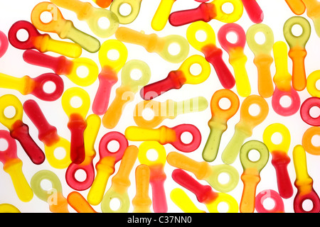 Caramelle gommose, diversi colori, gusto, contiene un sacco di zucchero e aromi artificiali. Forma di bimbo di dummy. Foto Stock