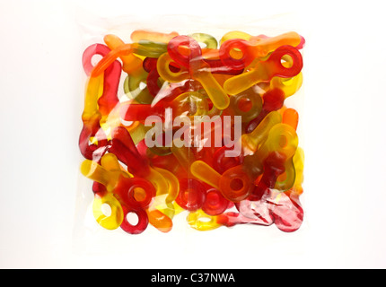 Caramelle gommose, diversi colori, gusto, contiene un sacco di zucchero e aromi artificiali. Forma di bimbo di dummy. Foto Stock