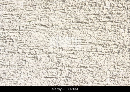 Vista ravvicinata della graffiante parete in cemento Foto Stock