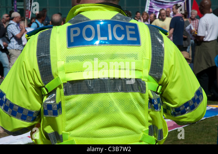 Greater Manchester Polizia (GMP) ufficiale di polizia un giorno di maggio Rally nel centro di Manchester. Foto Stock