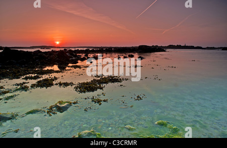 Sunrise Beach l'isola di Guernsey Foto Stock