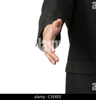 Imprenditore stretching fuori mano.isolato su bianco Foto Stock