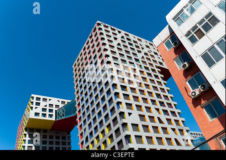 Moma legate complesso ibrido dall architetto Steven Holl, 2009, Dongzhimen District, Pechino, Cina, Asia. Foto Stock