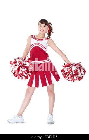 Cheerleader in azione con la sua pom-pom Foto Stock