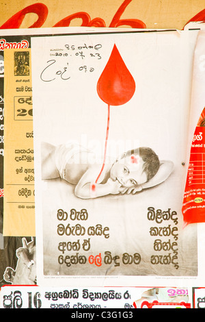 Un dello Sri Lanka " dona sangue " poster, visualizzati in tutta l'isola. Foto Stock