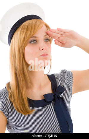 Giovane donna marine salutando navy vestito su bianco Foto Stock